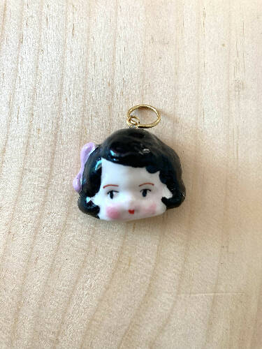 Doll head charm/pendant
