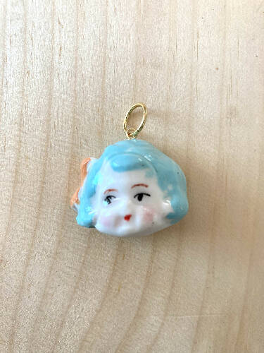 Doll head charm/pendant