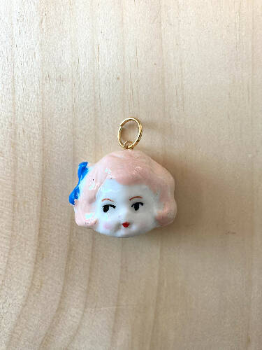 Doll head charm/pendant
