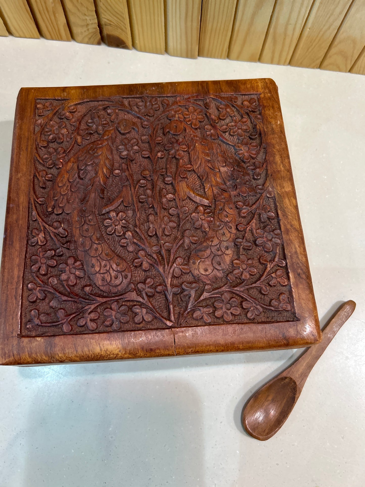 Wood carved box with birds