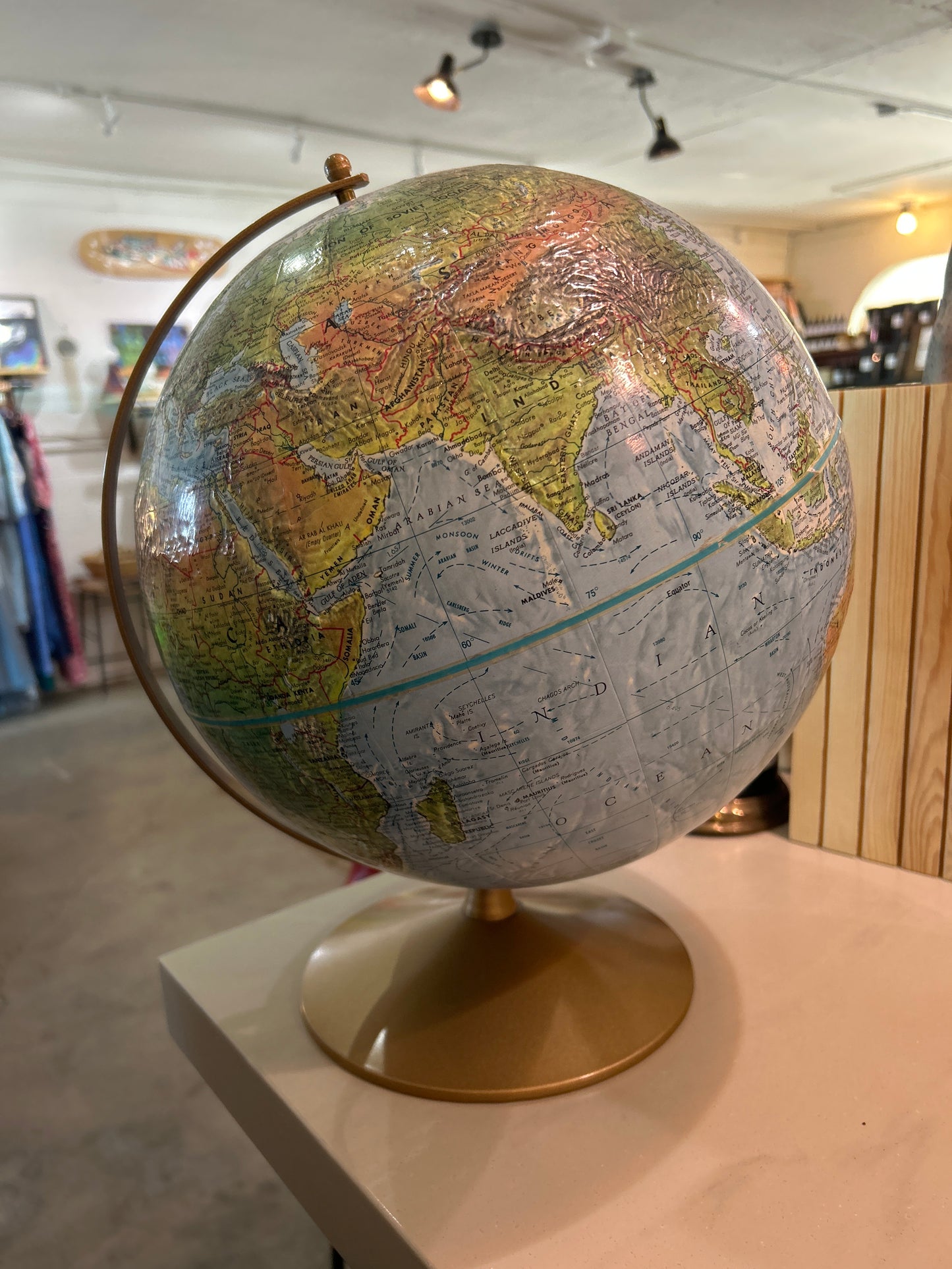 Vintage globe 12” diameter on brass stand