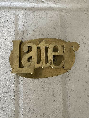 Brass “Later” paper holder for desk