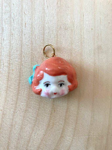Doll head charm/pendant